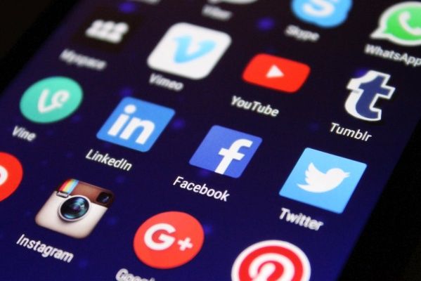 Stressed at work, happy on social networks — how is this possible?