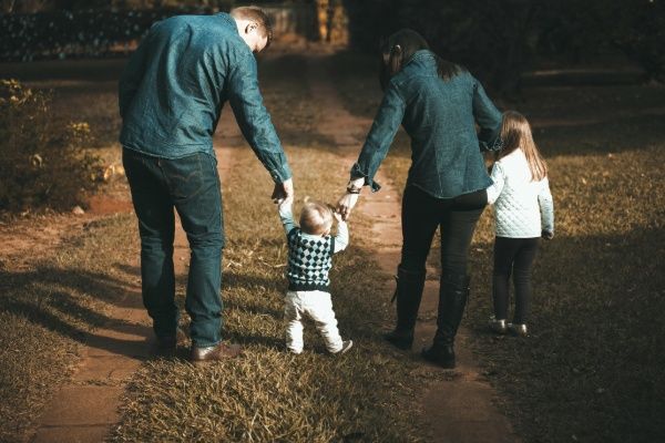 "How much does a normal life cost for a family of four with two children?"